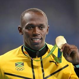 Track Legend Usain Bolt Holds Book Signing in Jamaica