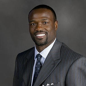 Former Seattle Mariners second baseman Harold Reynolds, left