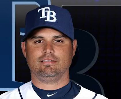 Tampa Bay Rays manager Kevin Cash, center, talks with catcher Mike